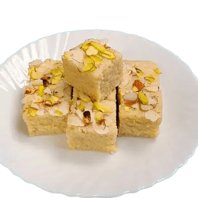 Badam-pista kalakand — slow-set with pistachio dust, photographed at the Khammam kitchen