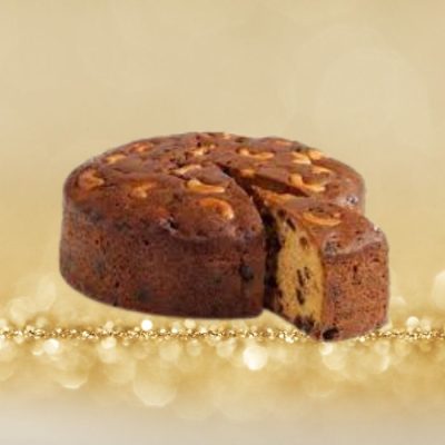 Plum cake, also known as fruitcake. It is a dense and moist cake packed with a variety of dried fruits, nuts, and warm spices, creating a delightful combination of flavors